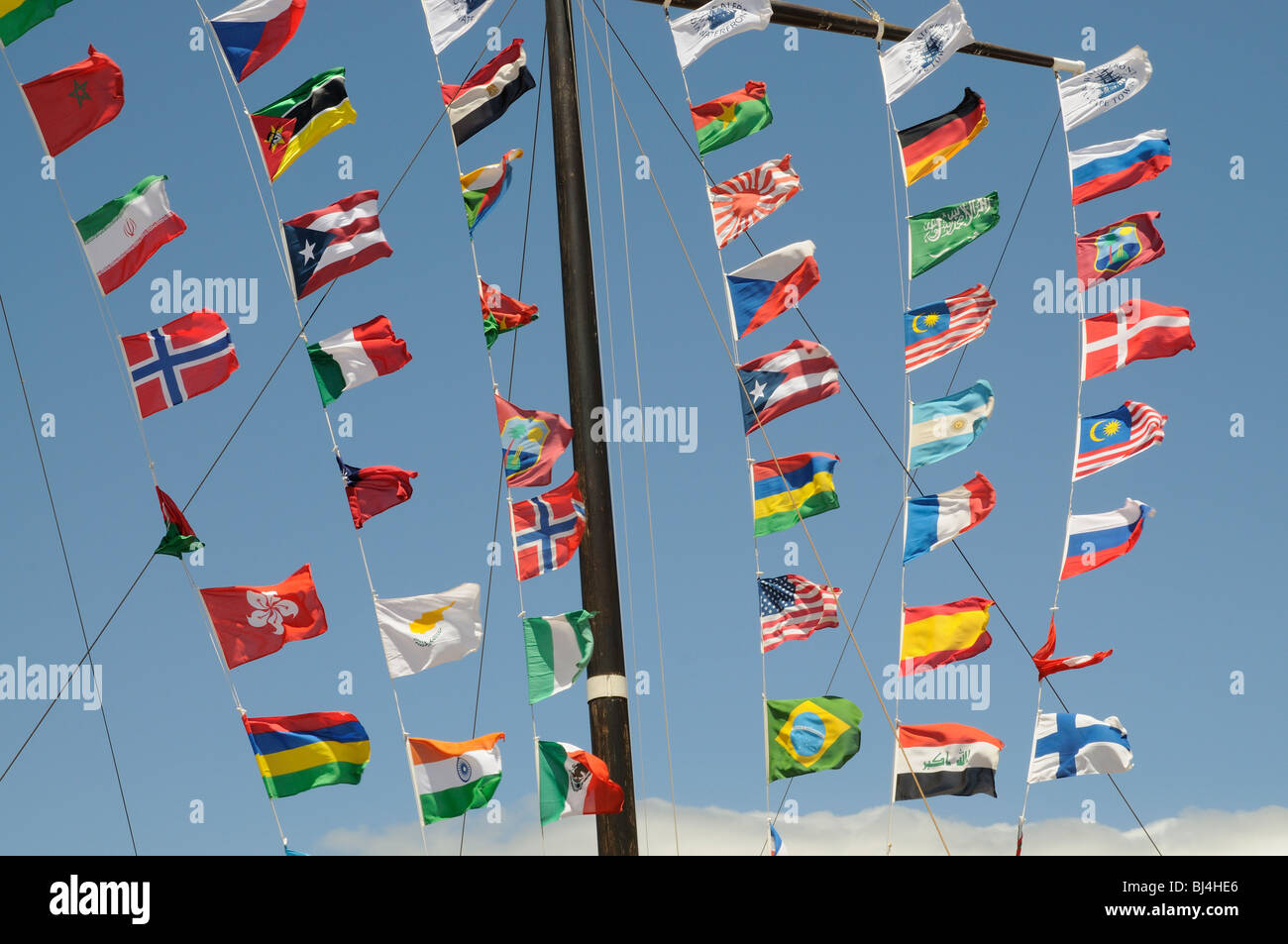 International flags flying over Flag Square on the V&A Waterfront Cape Town South Africa Stock Photo