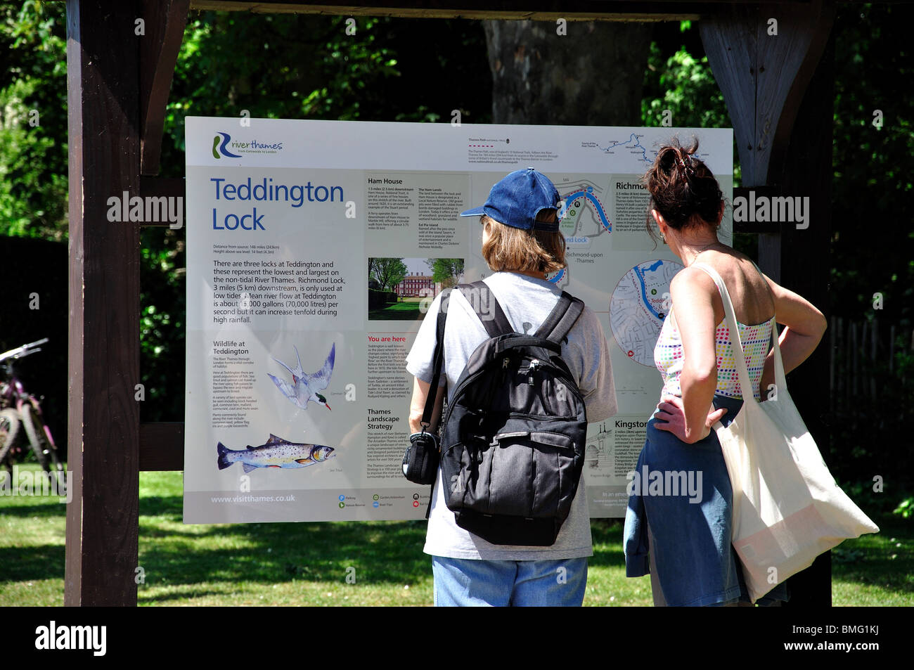 Women looking at area map, Teddington Lock, London Borough of Richmond upon Thames, Greater London, England, United Kingdom Stock Photo