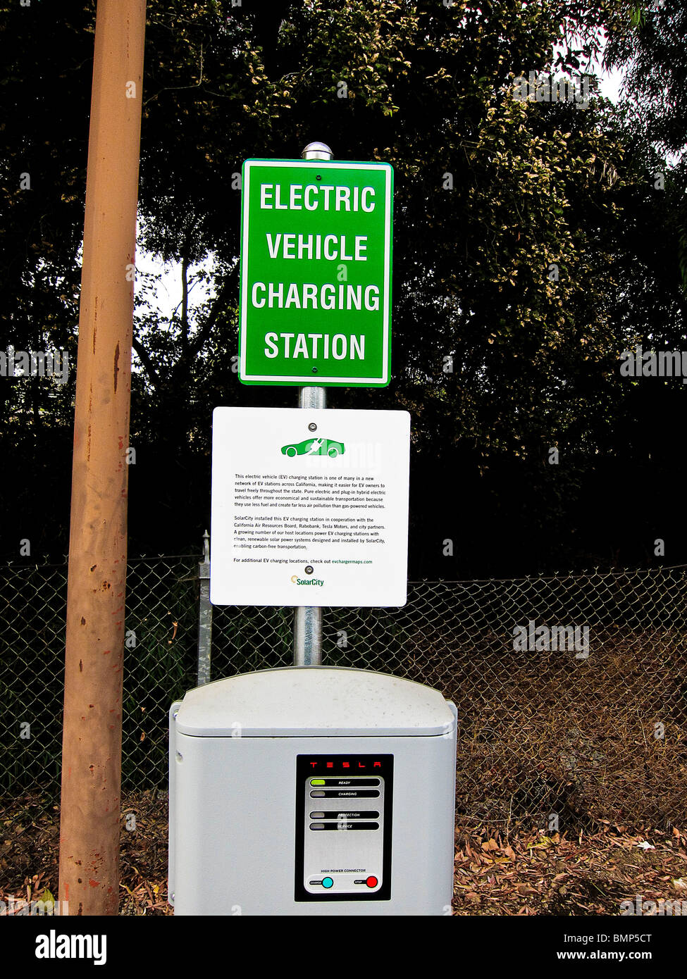 Charging station signs and equipment for electric vehicles, bank parking lot, Atascadero, California. Stock Photo