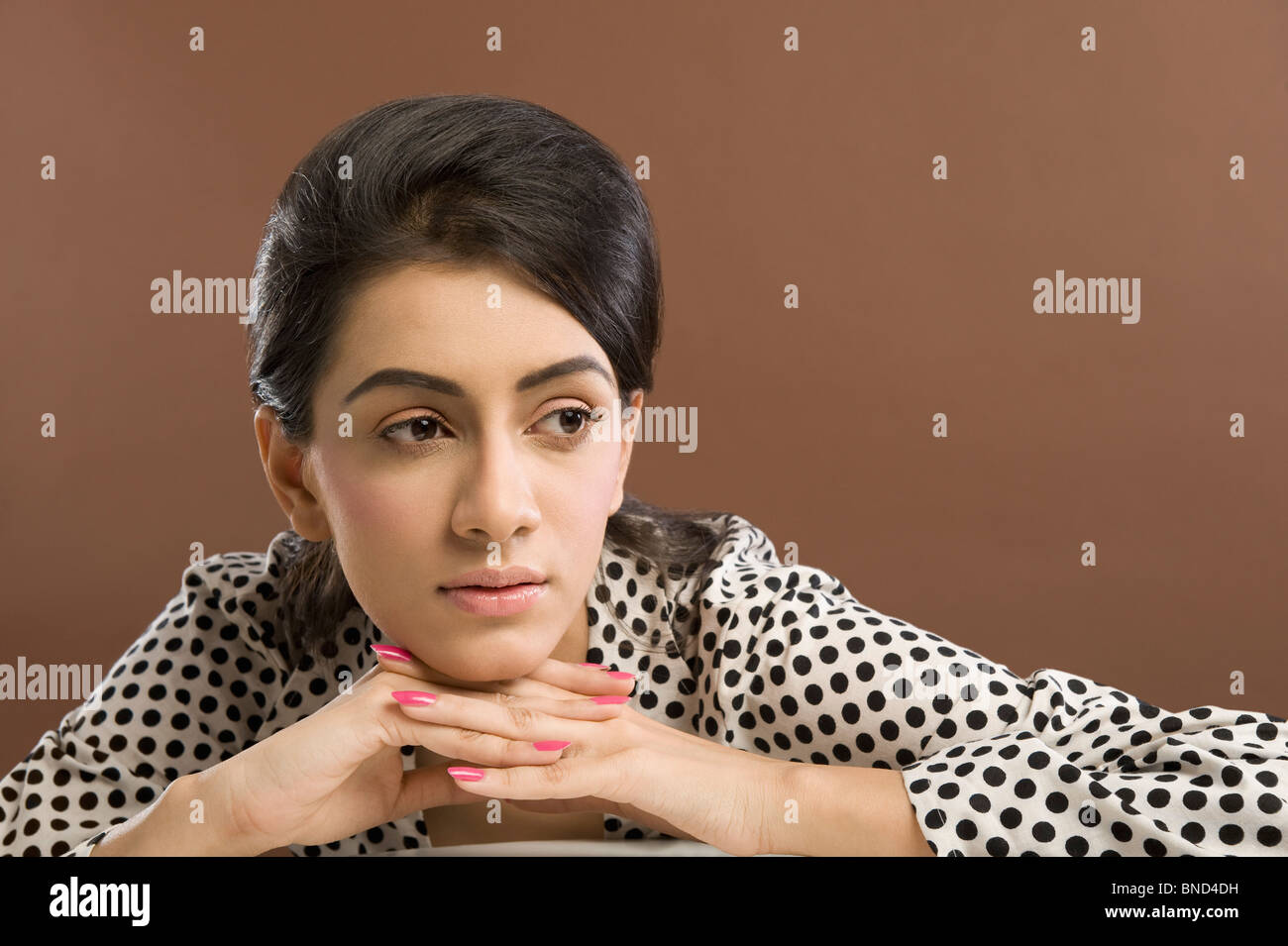 Close-up of a woman thinking Stock Photo