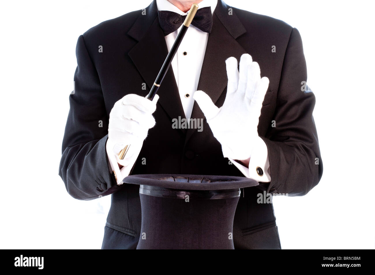 Magician Performing with Top Hat and Wand Stock Photo