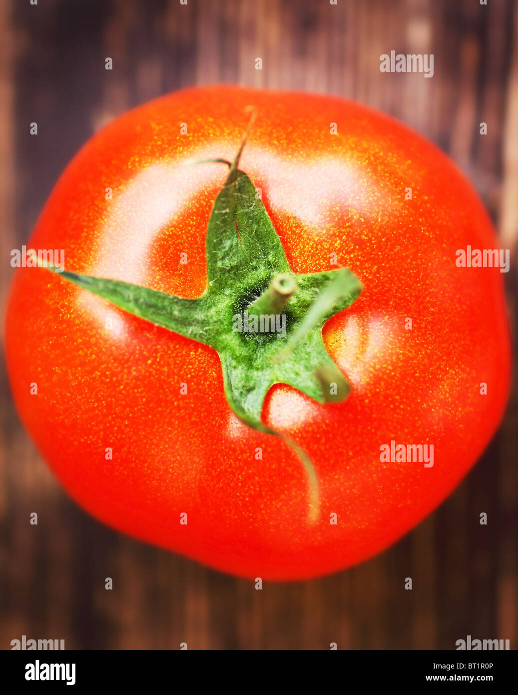 Closeup on red tomato with shallow DOF Stock Photo