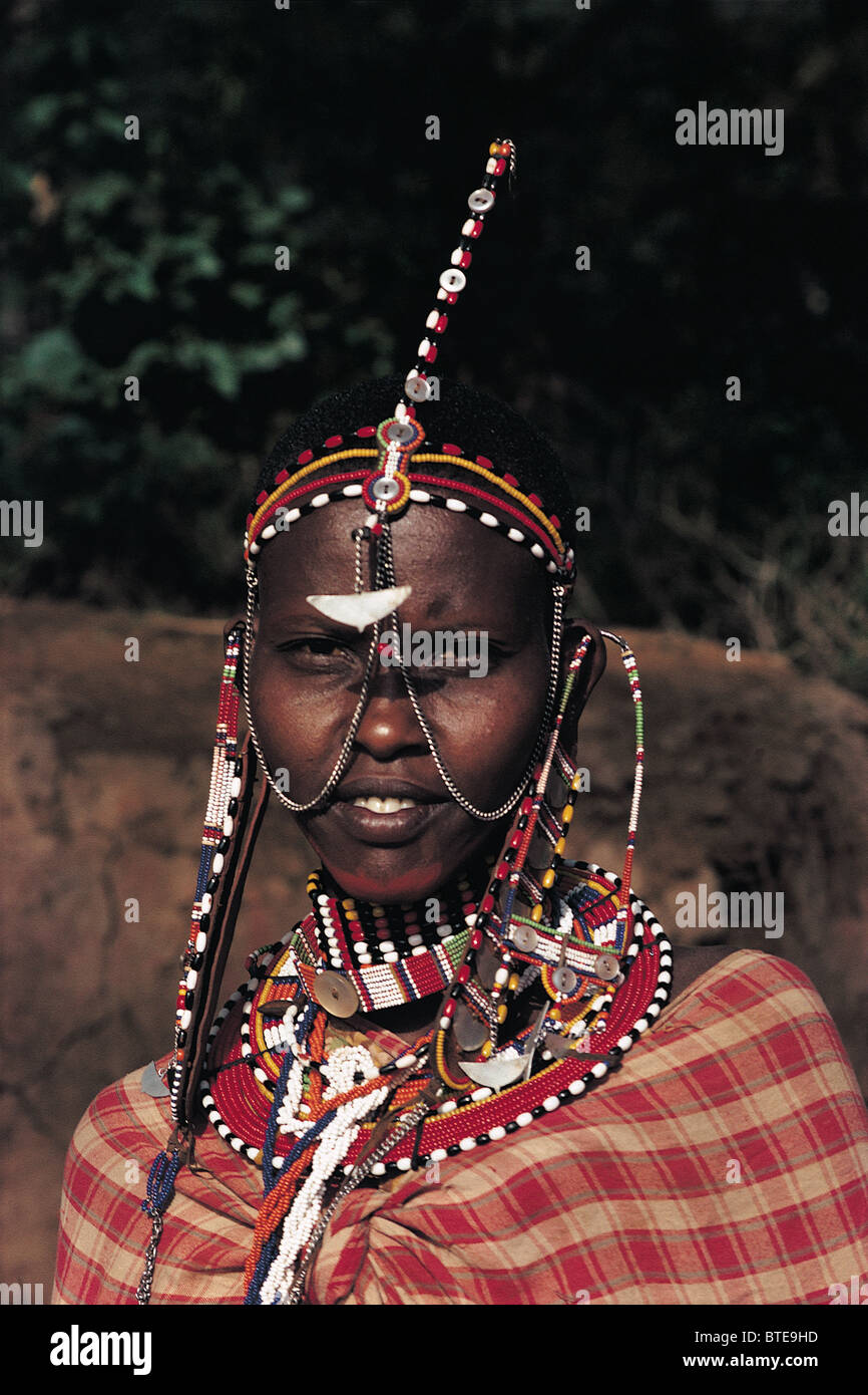 A portrait of a Maasai woman wearing the traditional garb Stock Photo