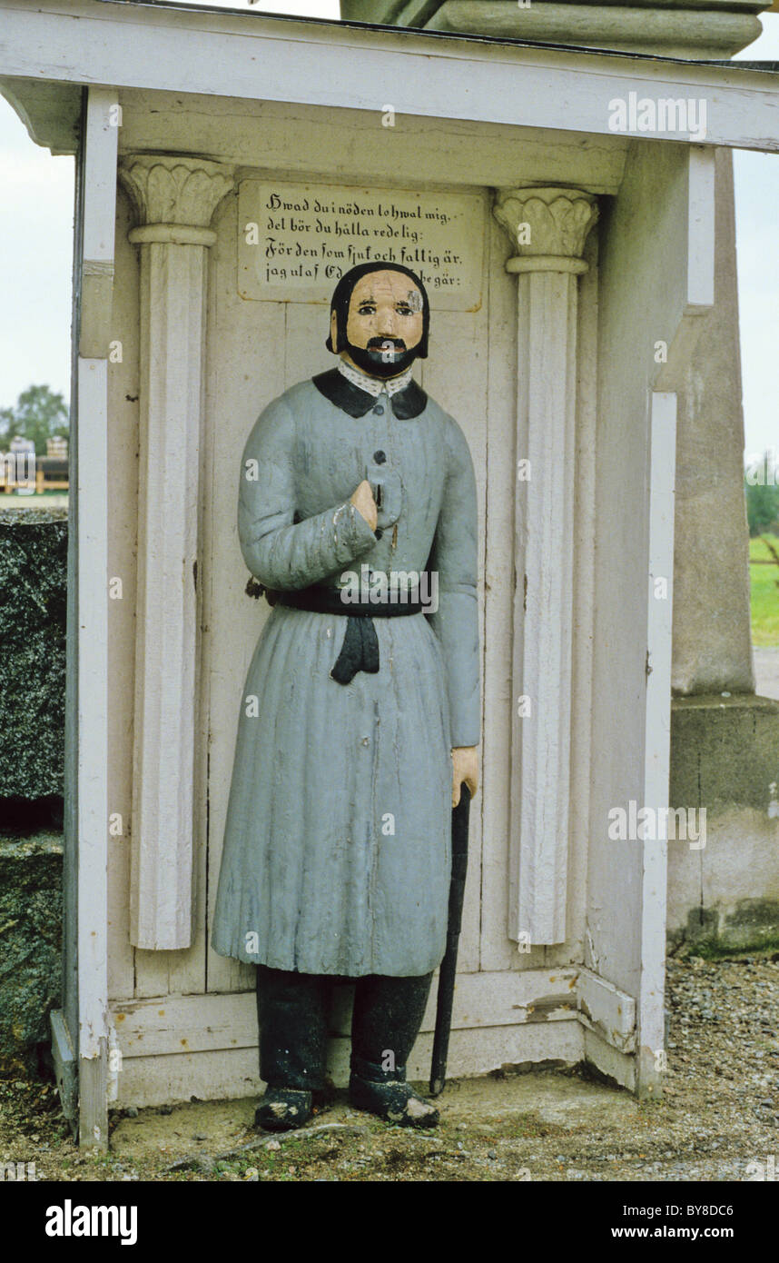 Vaivaisukko - a poor man statue outside the Evangelical Lutheran Church of Oravais (Oravais Kyrka), in Ostrobothnia, Finland. Stock Photo