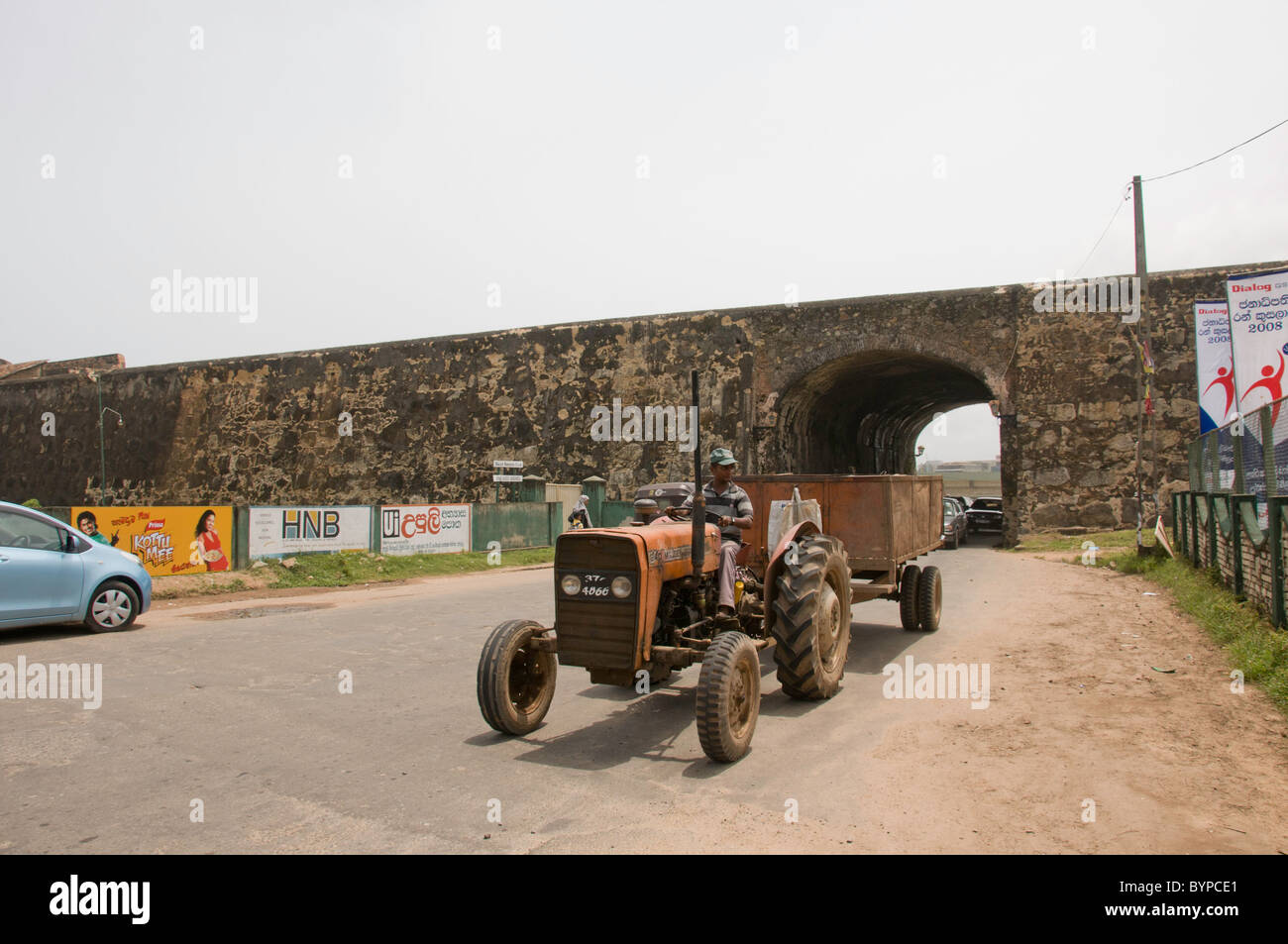 Massey Ferguson 240 Tractor is the cheapest tractor in Massey Ferguson tractor range, with trailer in Galle, Sri Lanka Stock Photo