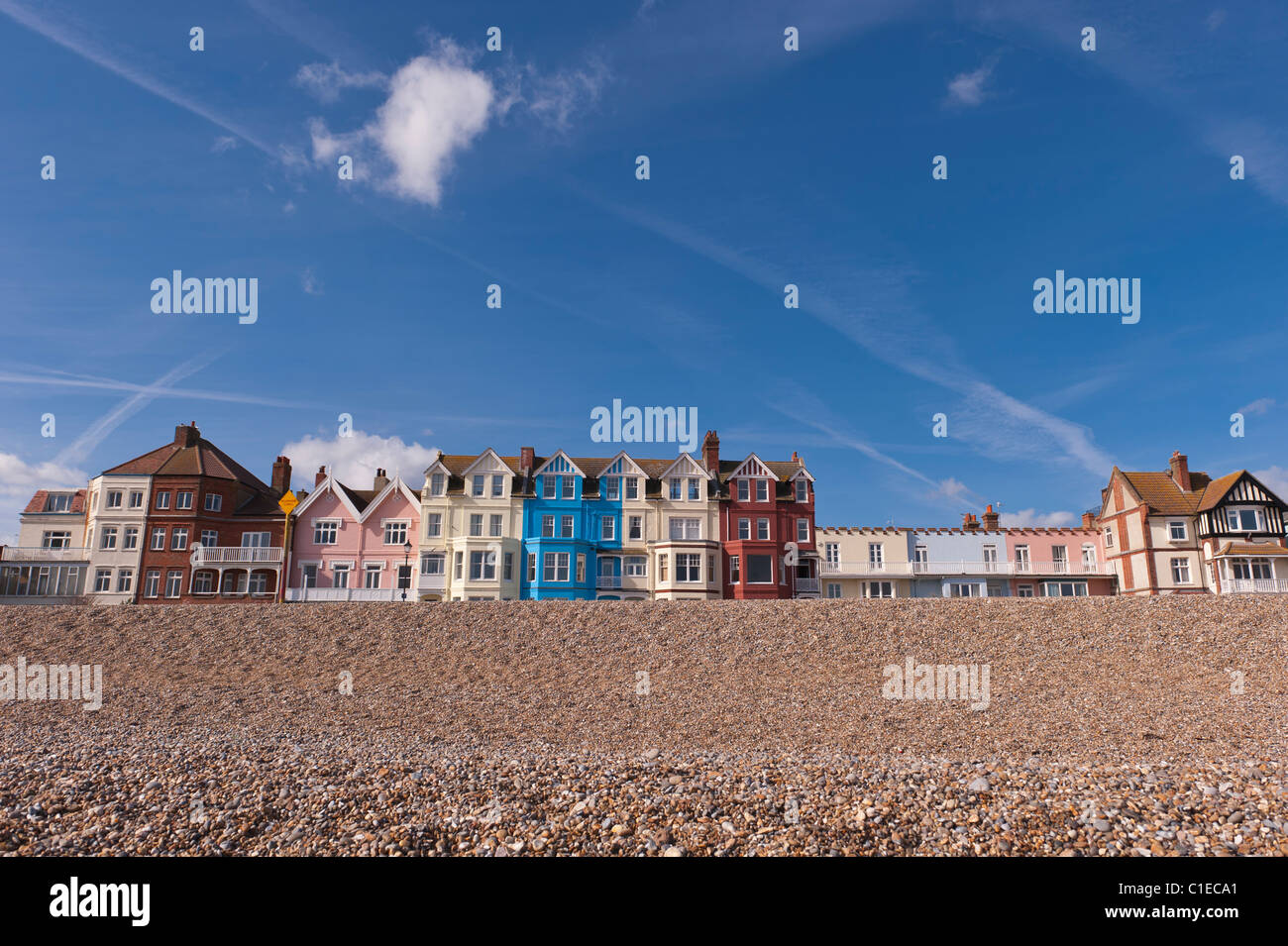 A row of colourful bay fronted houses on the seafront in Aldeburgh , Suffolk , England , Britain , Uk Stock Photo