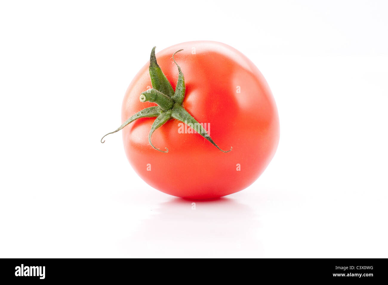 Single Fresh Red Tomato - over white background Stock Photo