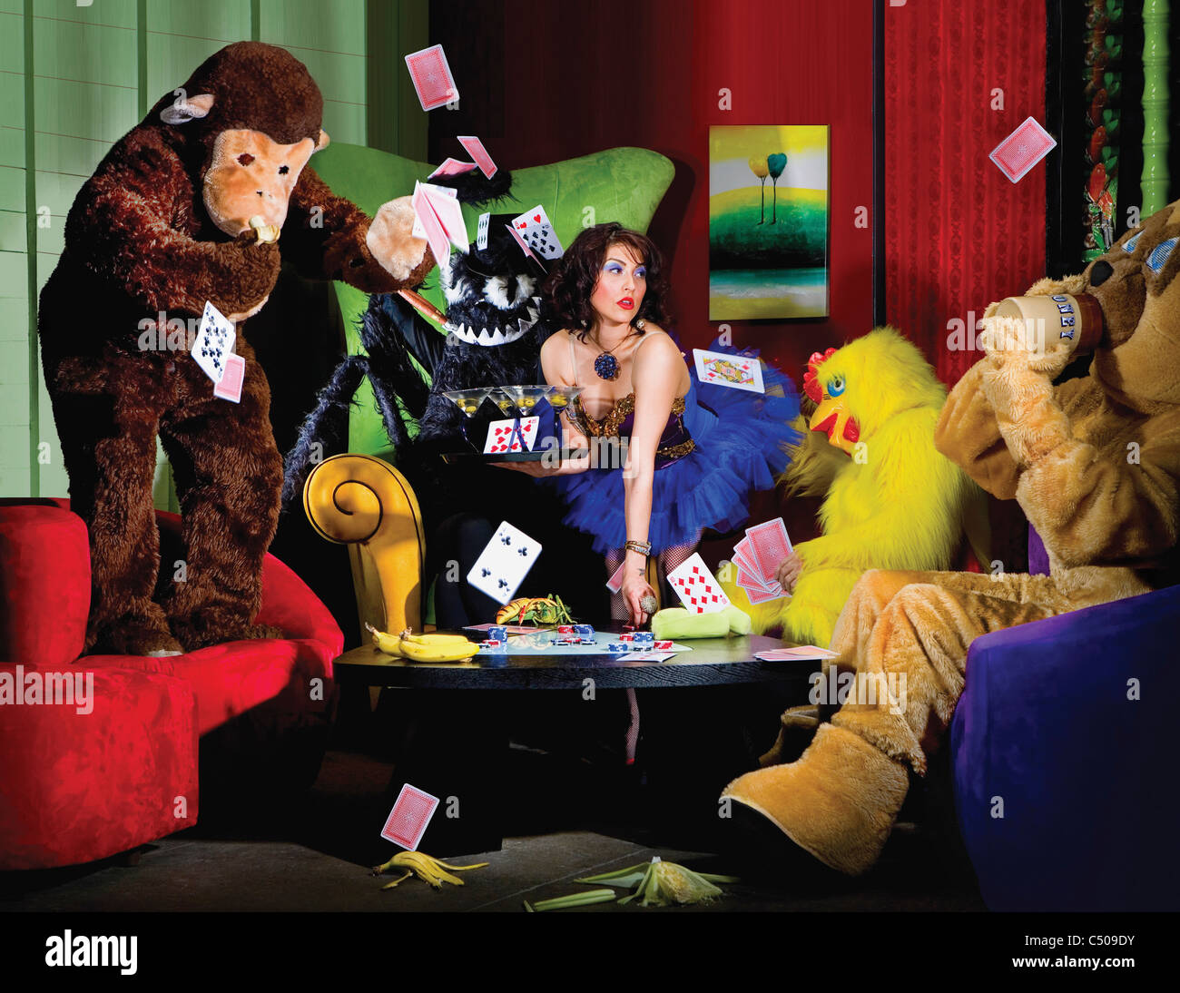 People in animal costumes playing poker Stock Photo