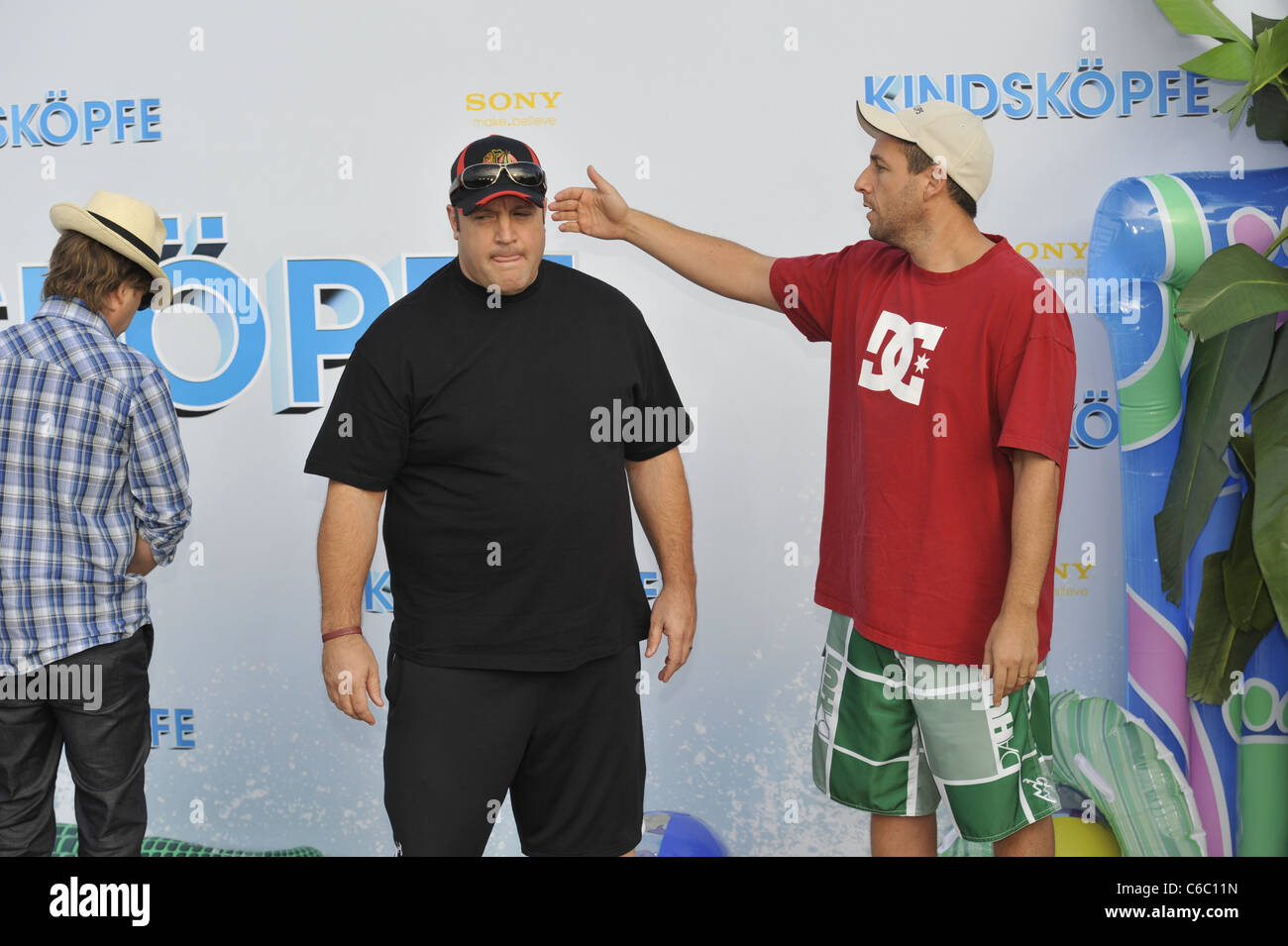 David Spade, Kevin James, Adam Sandler at the German premiere of 'Grown Ups' ('Kindskoepfe') at Berlin Beach at O2 World arena. Stock Photo