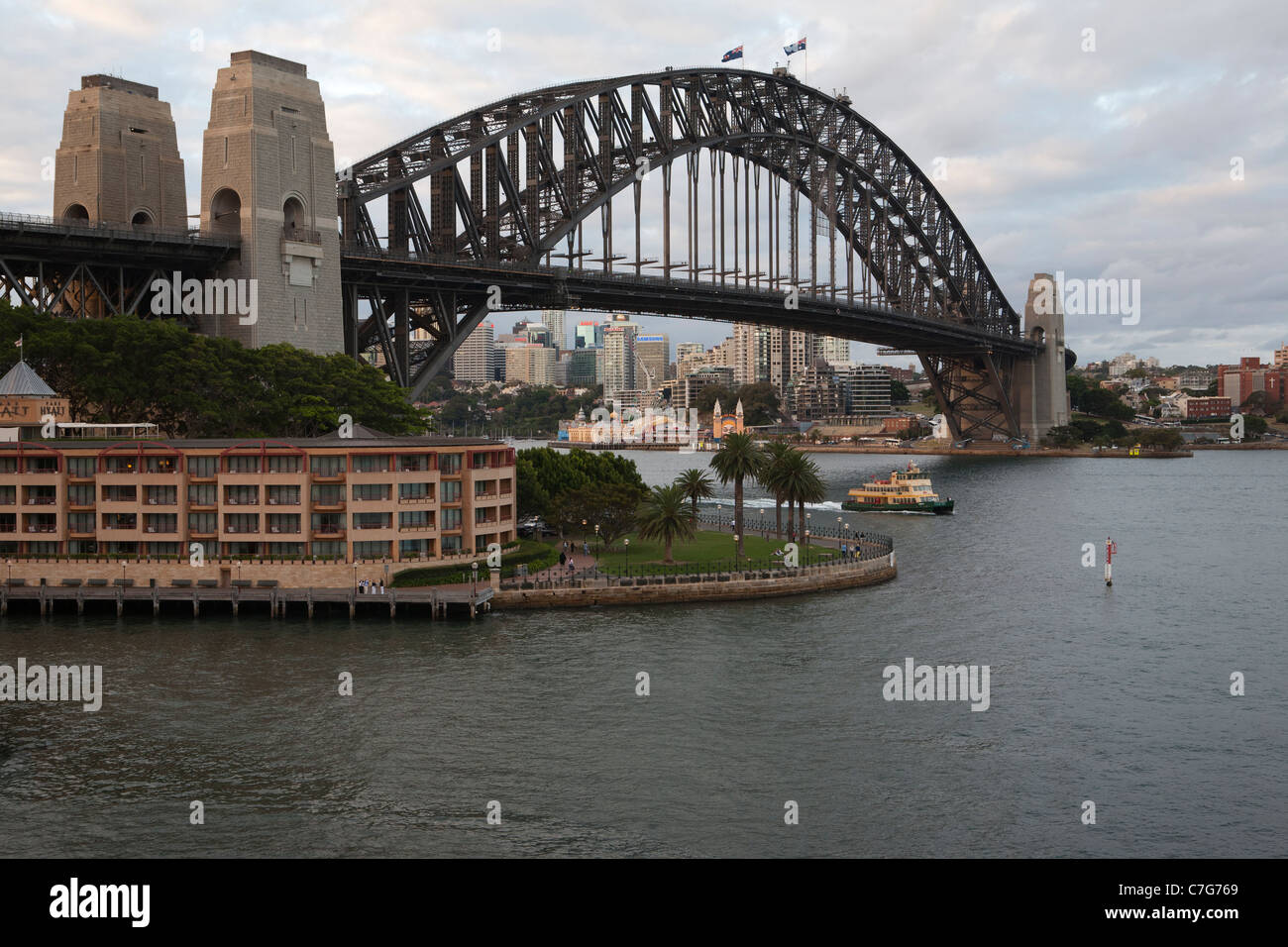 Sydney harbour bridge at dusk, Campbells Cove, Sydney, Australia Stock Photo