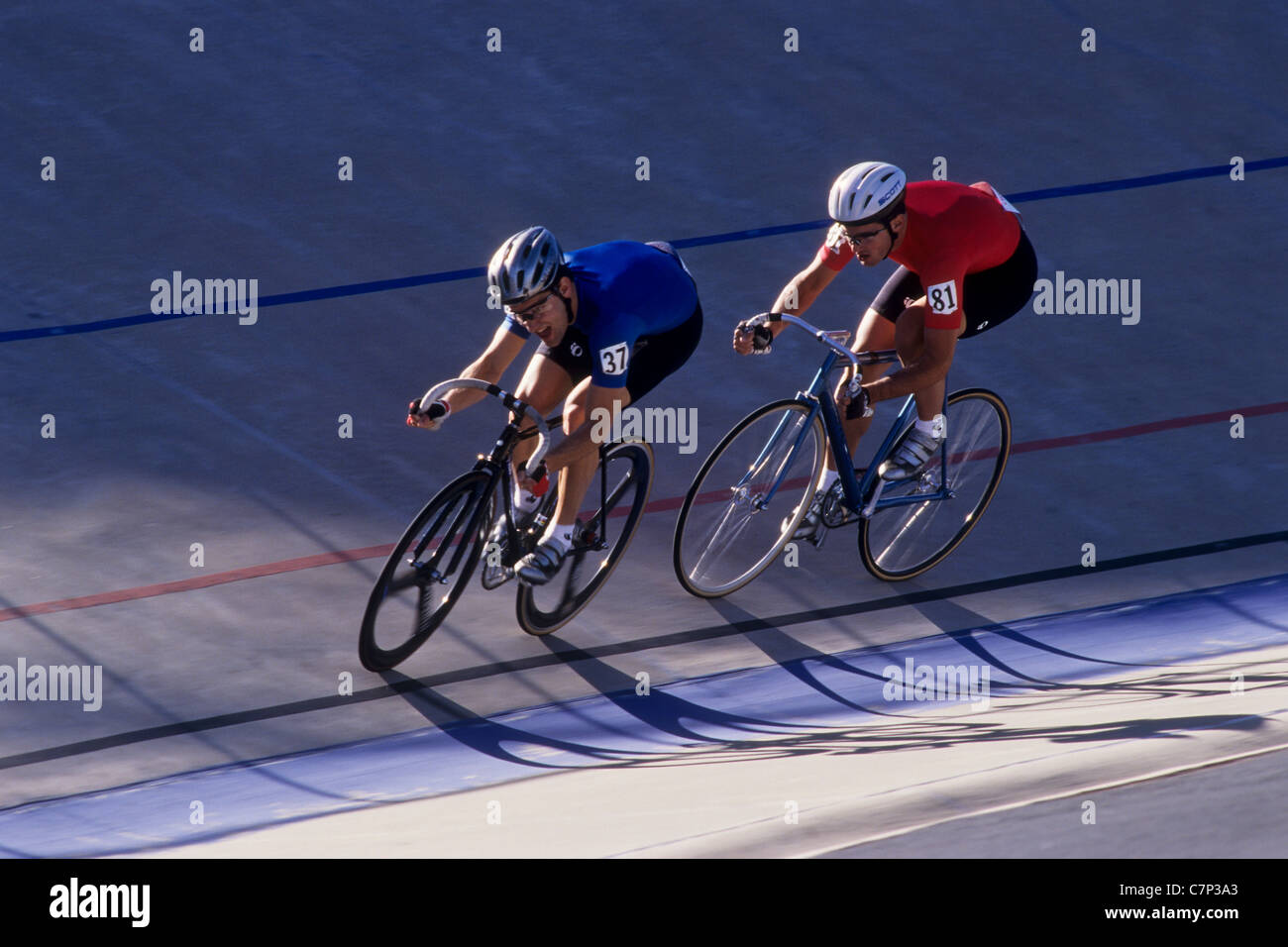 Male cyclist competing on the velodrome track. Stock Photo