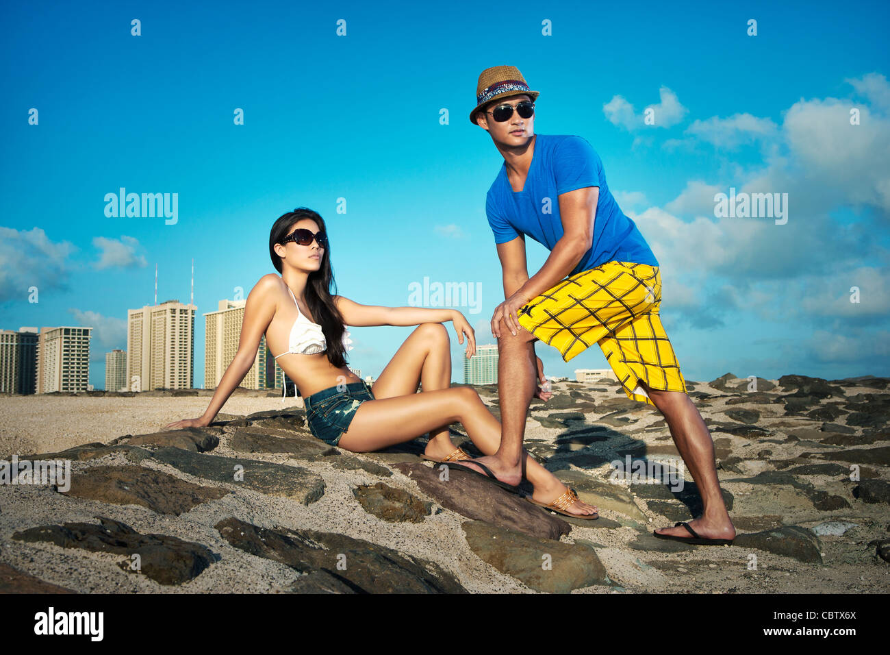 Couple on beach together Stock Photo