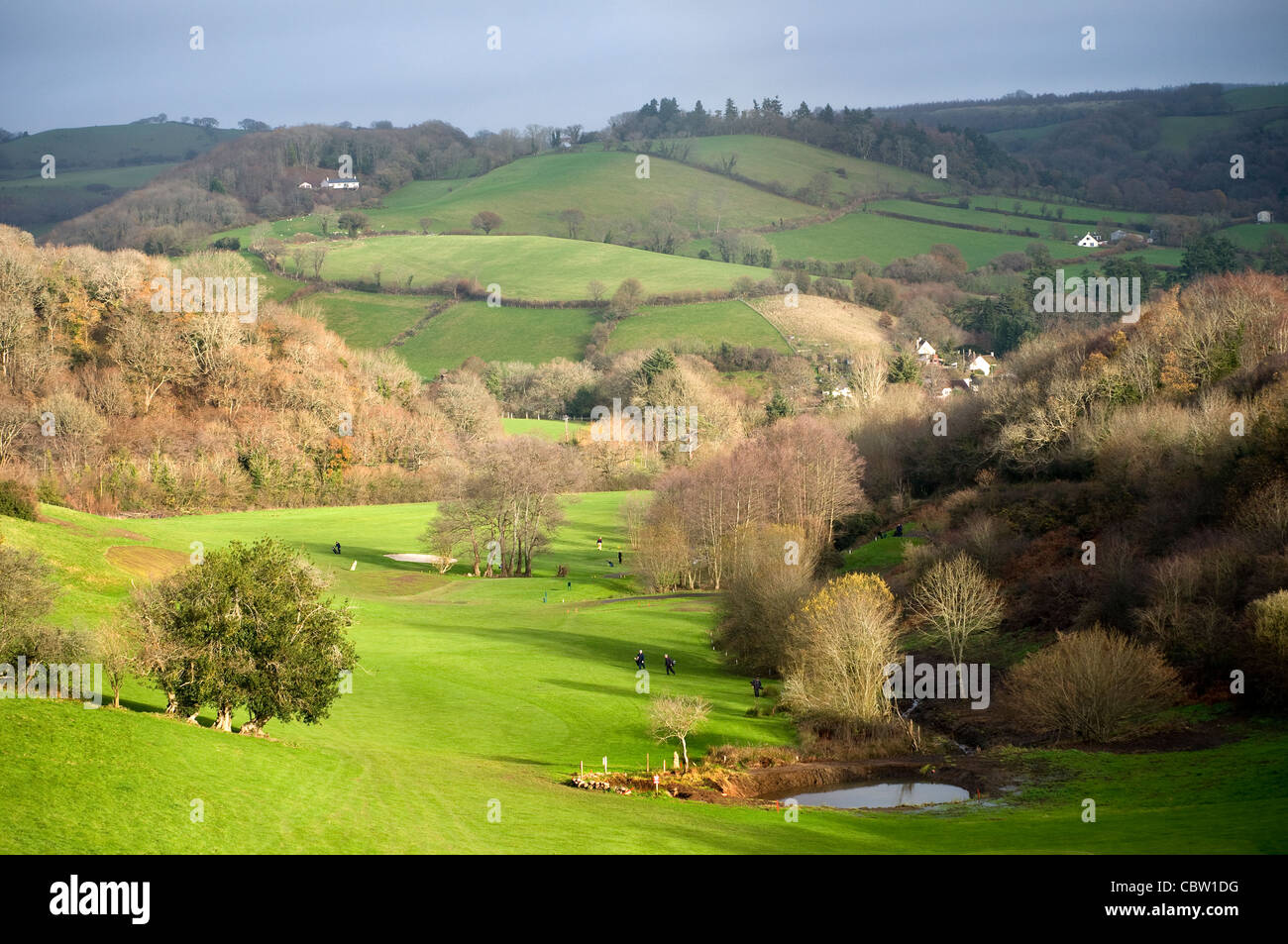 Teign valley golf course with village of Ashton,Devon,hamlet, hedgerows, hills, isolated, livestock,course, driver, exercise Stock Photo