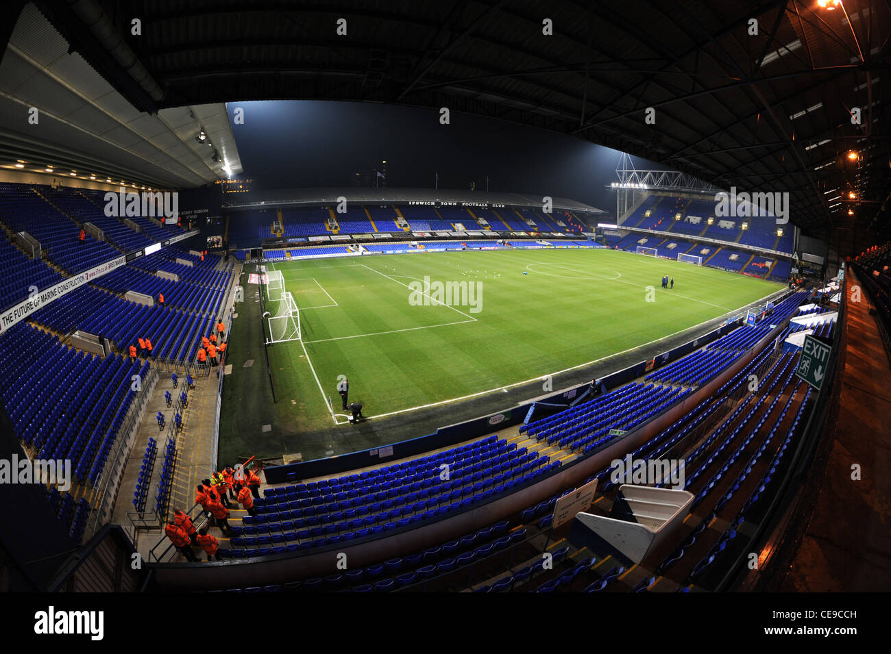 View inside Portman Road Stadium at night under floodlights, home of Ipswich Town Football Club Stock Photo