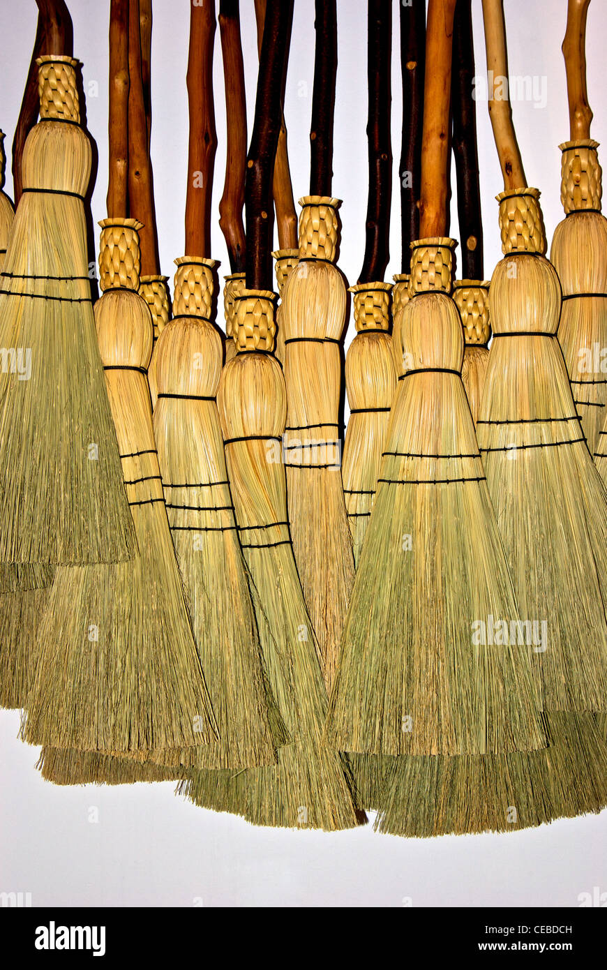 Custom hand made decorative straw brooms broom shop Granville Island Public Market Vancouver Stock Photo