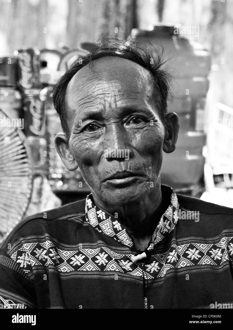 Elderly man in Da Nang, Vietnam (colour version available at CF0K1B) Stock Photo