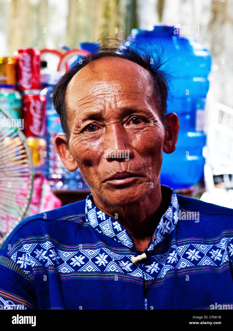 Elderly man in Da Nang, Vietnam (black and white version available at CF0K0M) Stock Photo