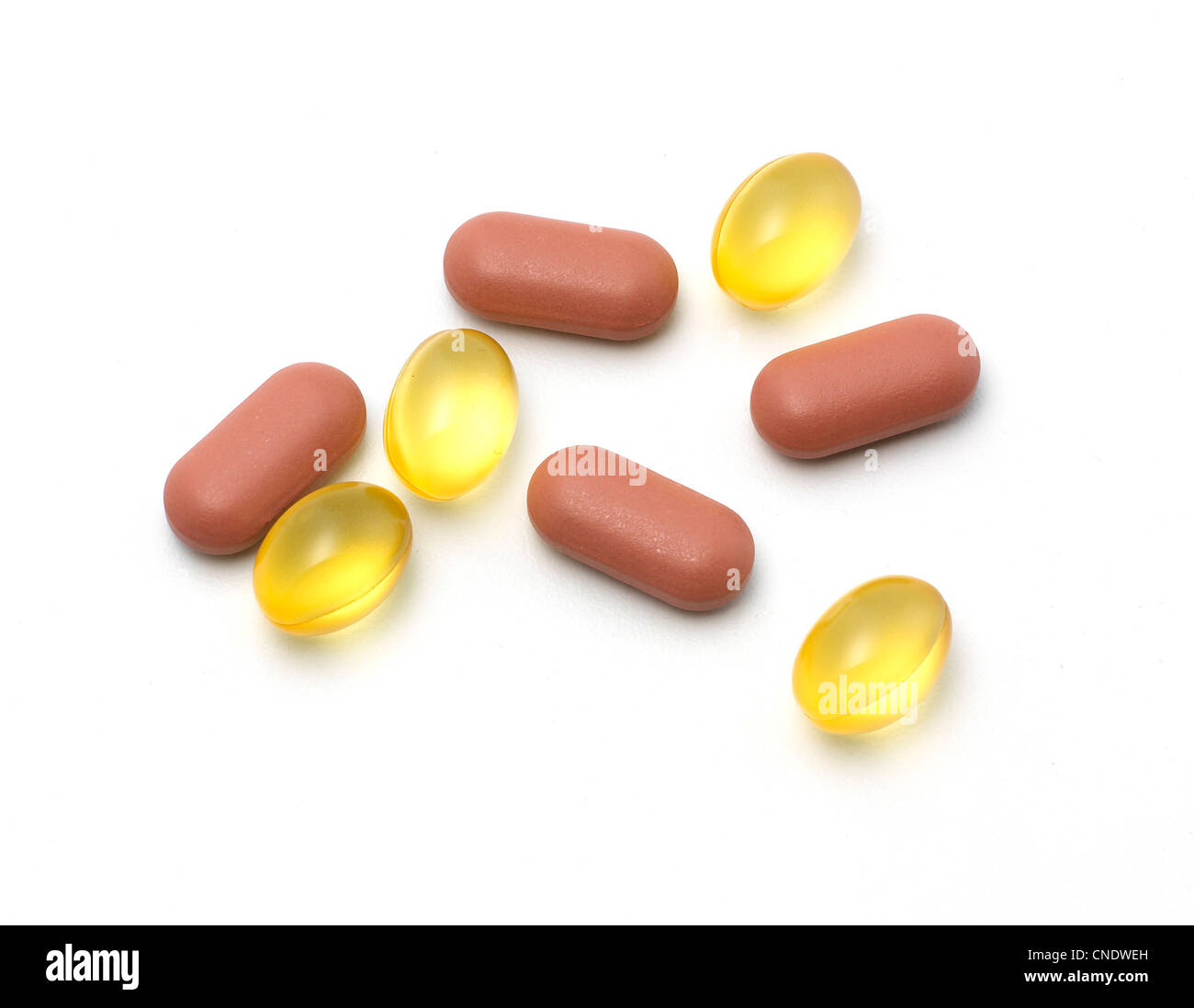 Two sets of pills Stock Photo