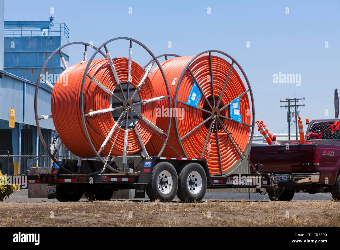 Industrial size spools of fiber optics cables Stock Photo