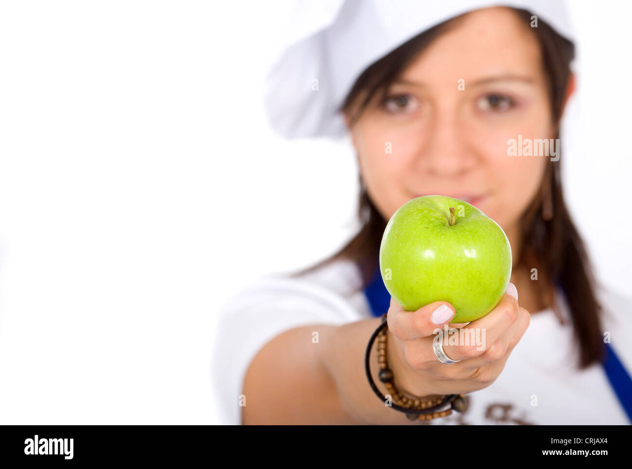 female cook with an apple Stock Photo