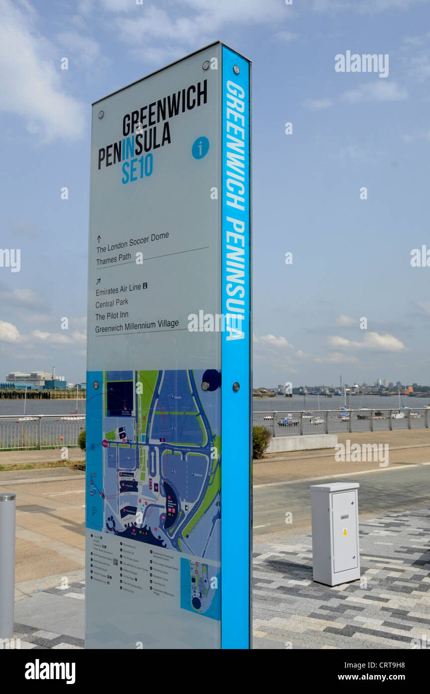 Modern information panel & signpost with detailed map located beside River Thames path at Greenwich Peninsula London England UK Stock Photo