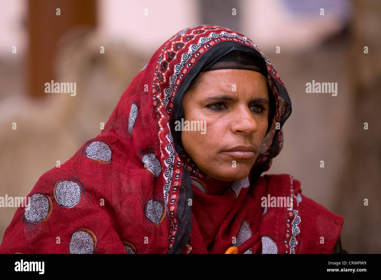 Woman at the livestock souq, Nizwa, Ad Dakhiliyah, Oman Stock Photo