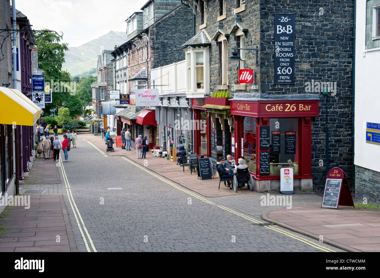 View along a shopping street in Keswick, Cumbria Stock Photo