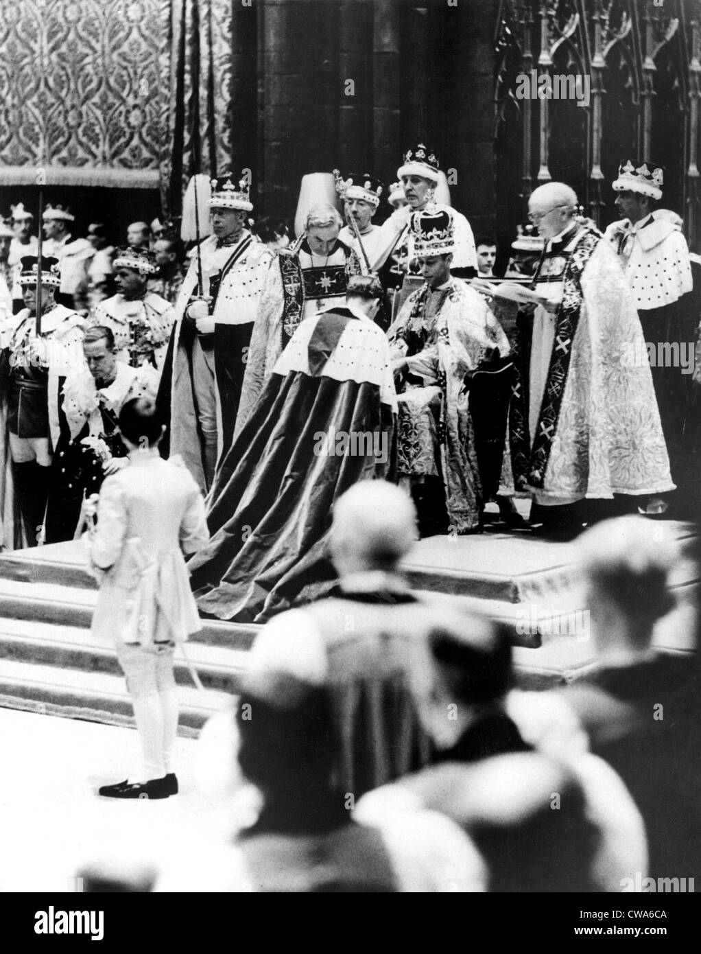 Peers, present in Westminster Abbey, London, May 12, on the occasion of the coronation of Queen Elizabeth I, who pays homage to Stock Photo