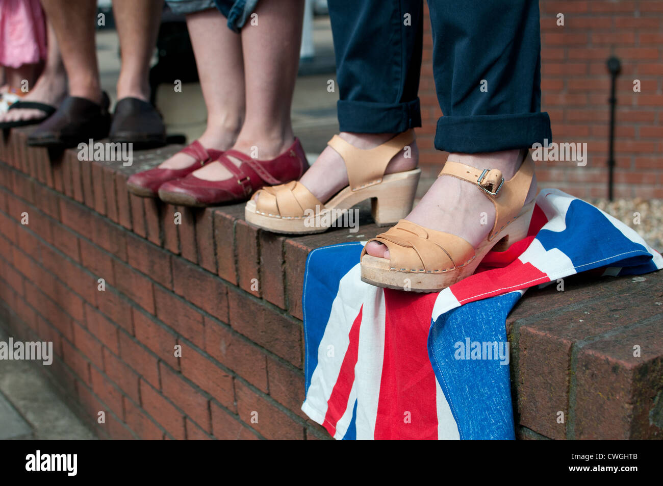 feet of supporters at Olympic Cycle race Twickenham Middlesex Stock Photo