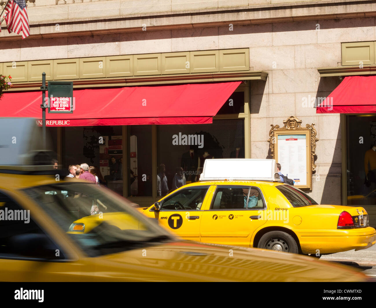 NYC Yellow Taxis featuring the new ' Letter T'  logo Stock Photo