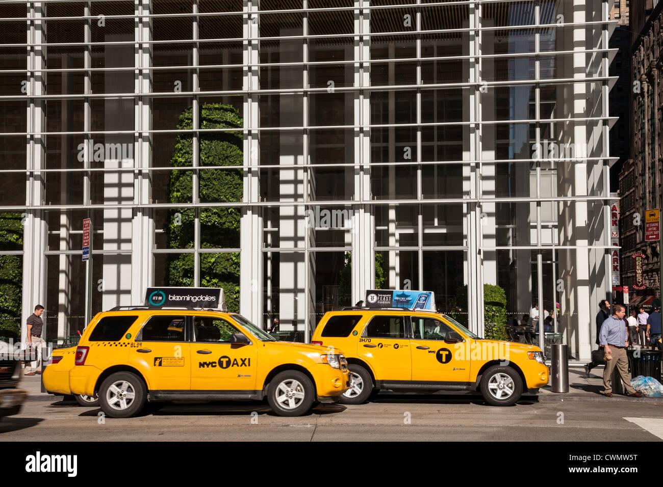 NYC Yellow Taxis featuring the new ' Letter T'  logo and older current Taxi design Stock Photo