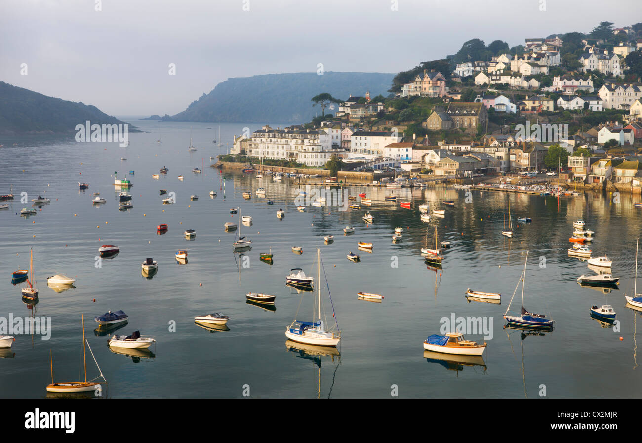 Early morning sunlight on Salcombe and the yachts in Kingsbridge Estuary, South Hams, Devon, England. Autumn (September) 2010. Stock Photo