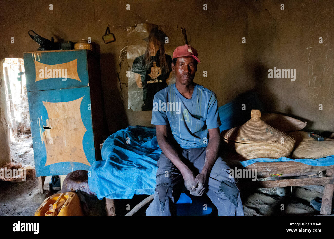 Melka Country Ethiopia Africa Oromo Tribe poor man inside on bed of his humble house proud and glad to have a home #4 Stock Photo