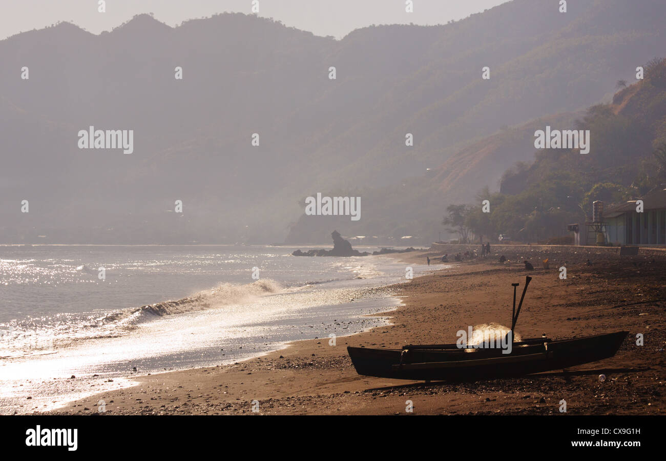 Silhouette of a traditional fishing boat on a beach, Dili, East Timor Stock Photo