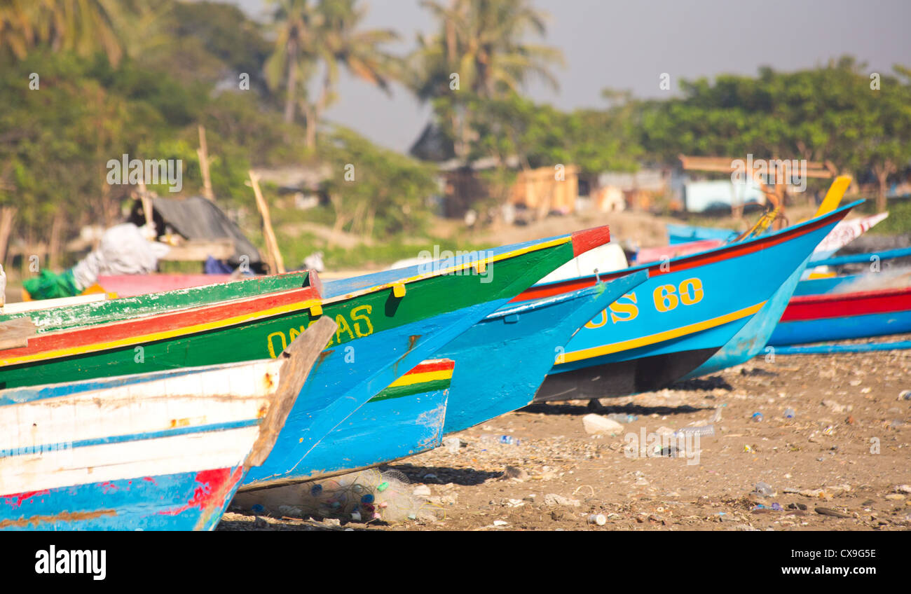 Colourful traditional fishing boats on a beach, Dili, East Timor Stock Photo