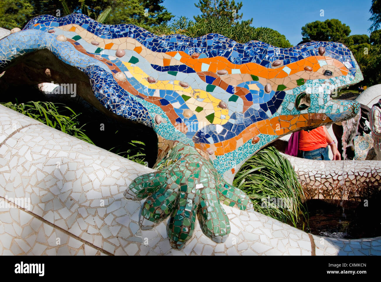 Antoni Gaudi's mosaic dragon fountain at entrance of Parc Guell in Barcelona Stock Photo