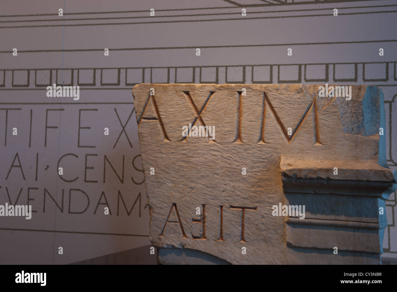 Roman letters and numerals Carved in stone. Stock Photo