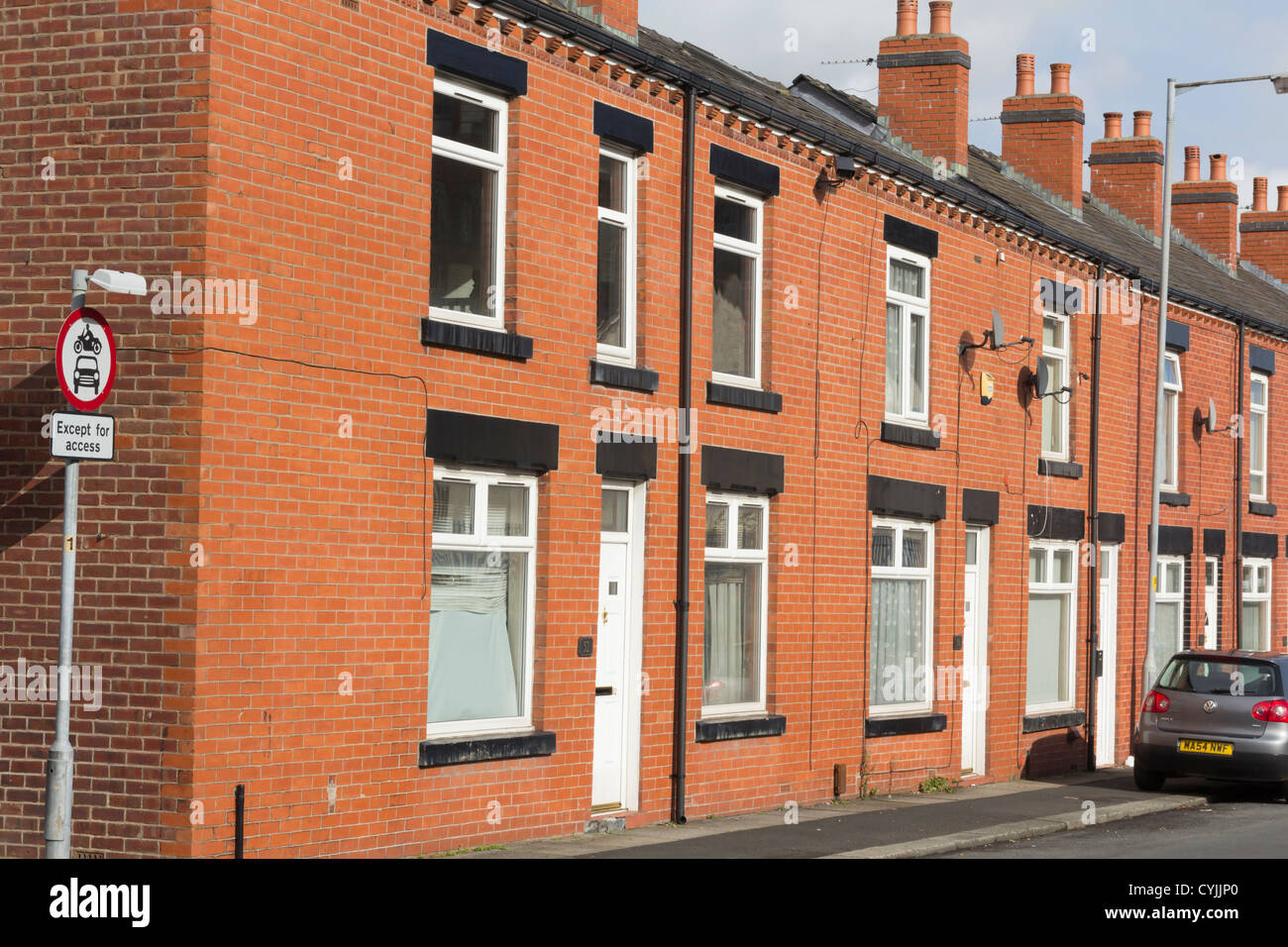 Nineteenth century terraced houses on Campbell Street, Farnworth. The houses have no front garden. Stock Photo