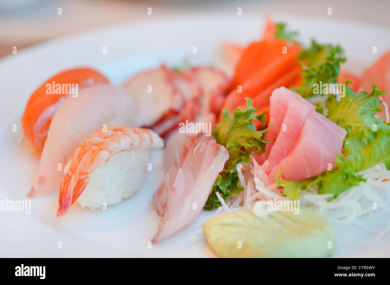 Mixed sushi and sashimi served with vegetable Stock Photo