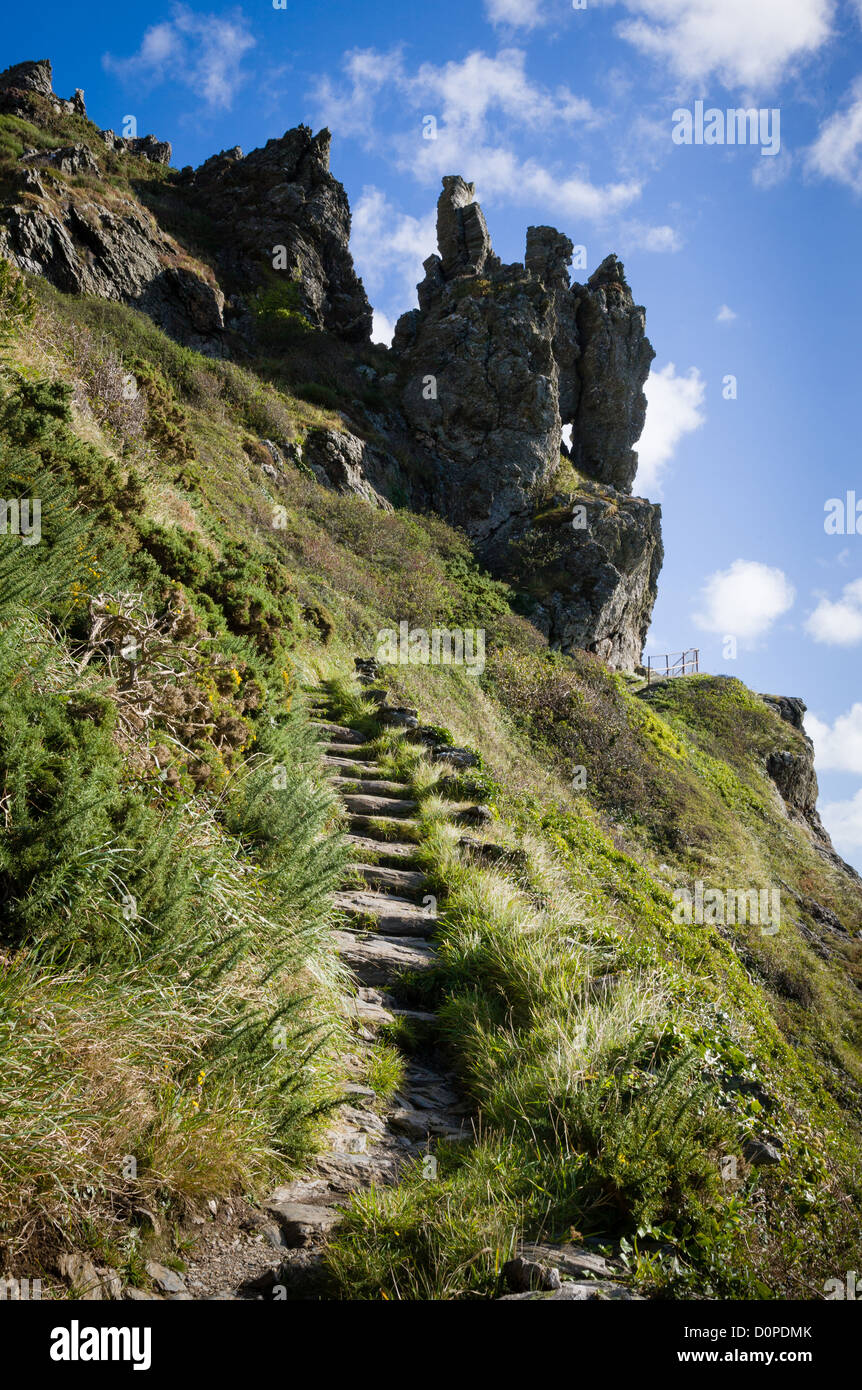 Coast path up to the dramatic rock pinnacles at Sharp Tor near Bolt head and Salcombe on the South Devon coast Stock Photo