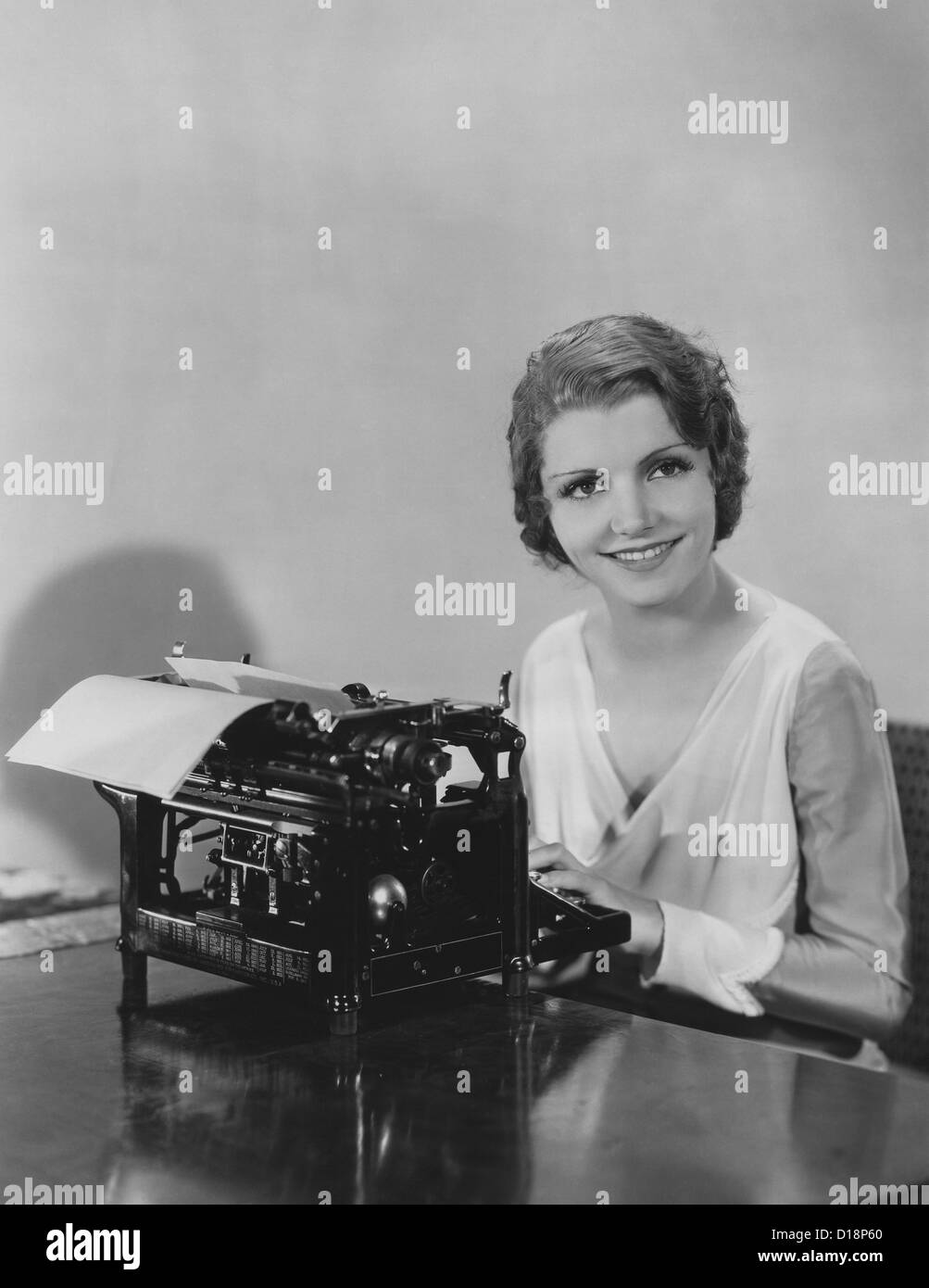 Happy typist Stock Photo