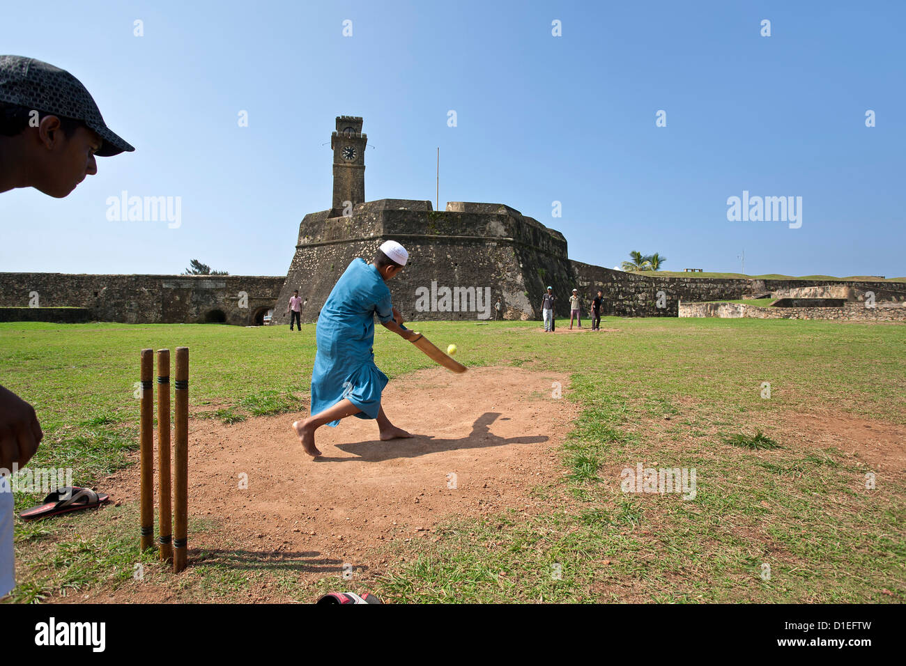 Boys playing cricket. Galle. Sri Lanka Stock Photo