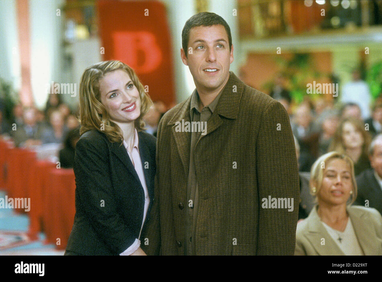 Mr. Deeds  Mr. Deeds  Winona Ryder, Adam Sandler Reporterin Babe Bennett (Winona Ryder) berichtet ueber Longfellow Deeds (Adam Stock Photo