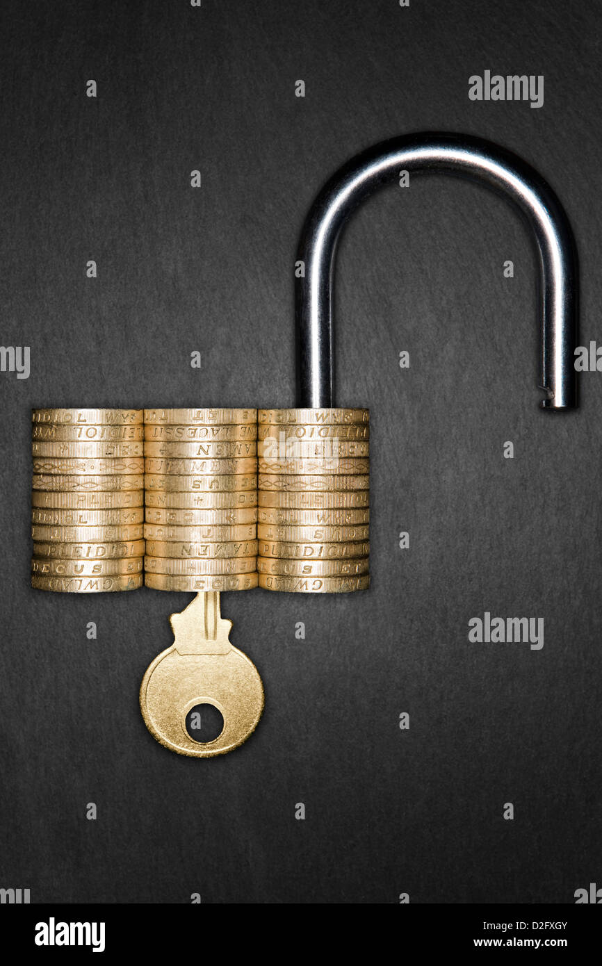 Financial security / savings / ISA concept - Unlocked Padlock made form pound coins with a gold key inserted Stock Photo