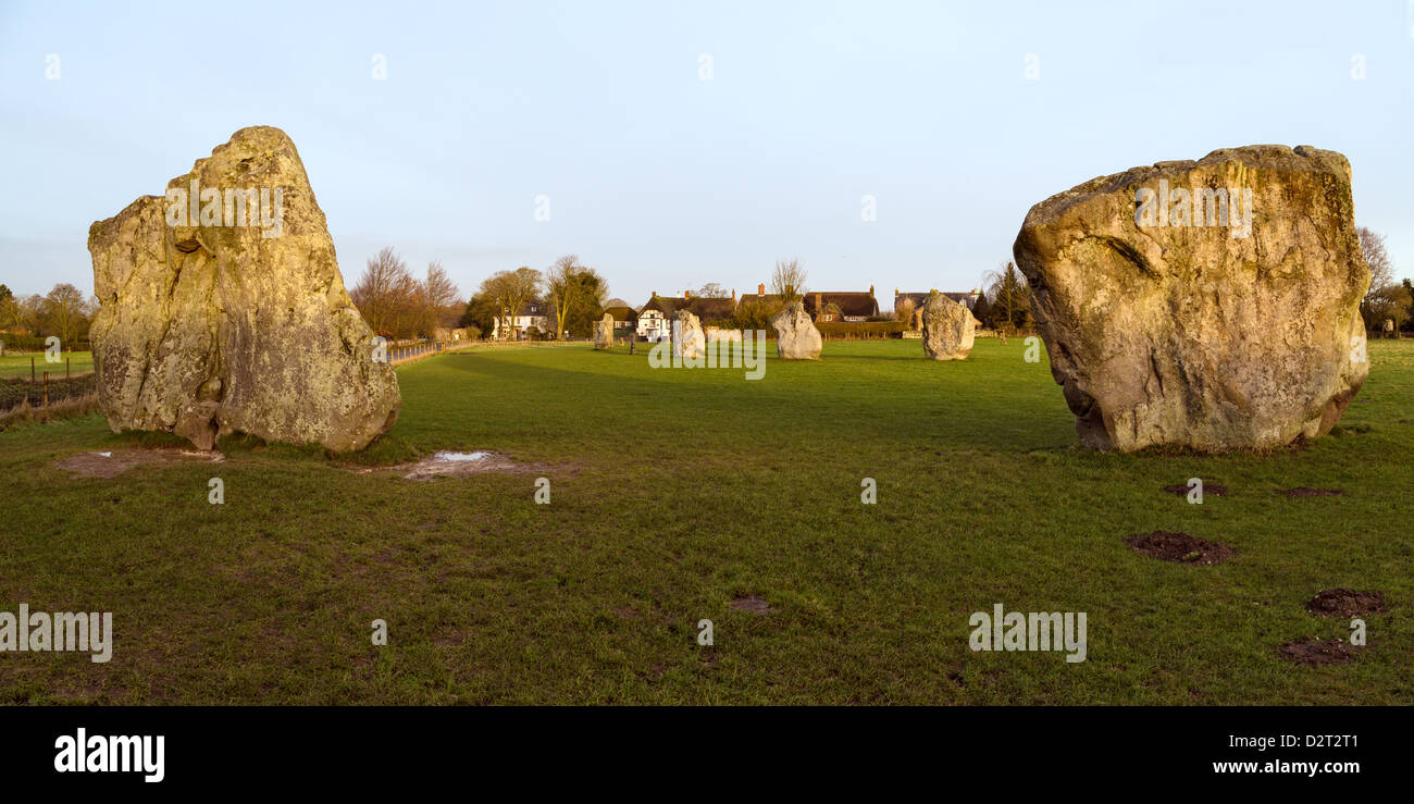 Sunrise of the great standing stones at Avebury stone circle, part of the World Heritage site complex in Wiltshire. Stock Photo