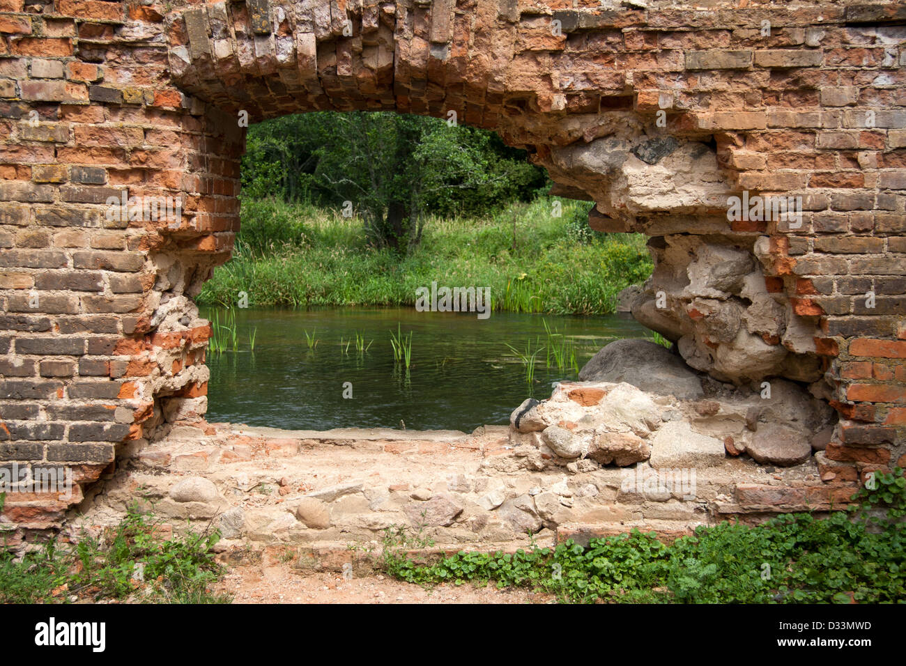 hole in the brick wall Stock Photo