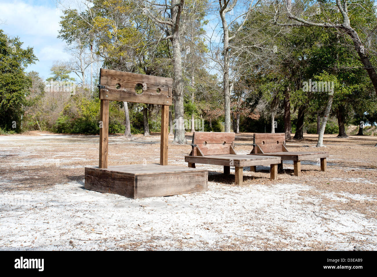 Pillory and stocks used for punishment and public humiliation in Brunswick Town, North Carolina. Stock Photo