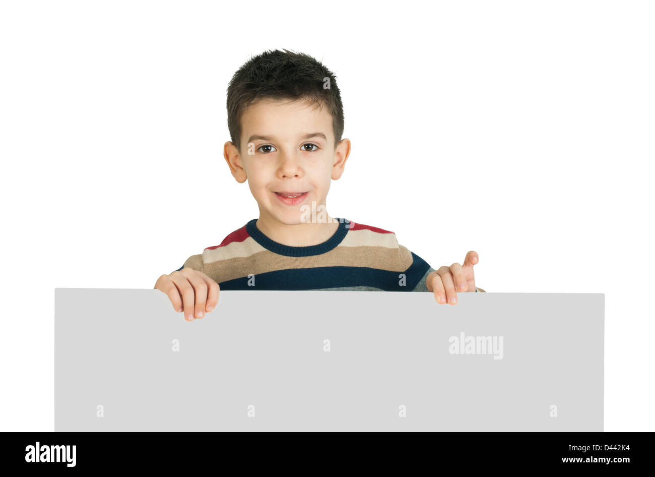 Little boy holding a whiteboard. White isolated studio shot Stock Photo