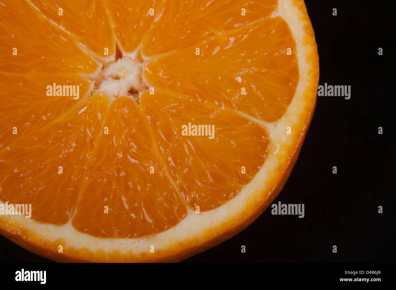 close - up photo of orange on a black background Stock Photo