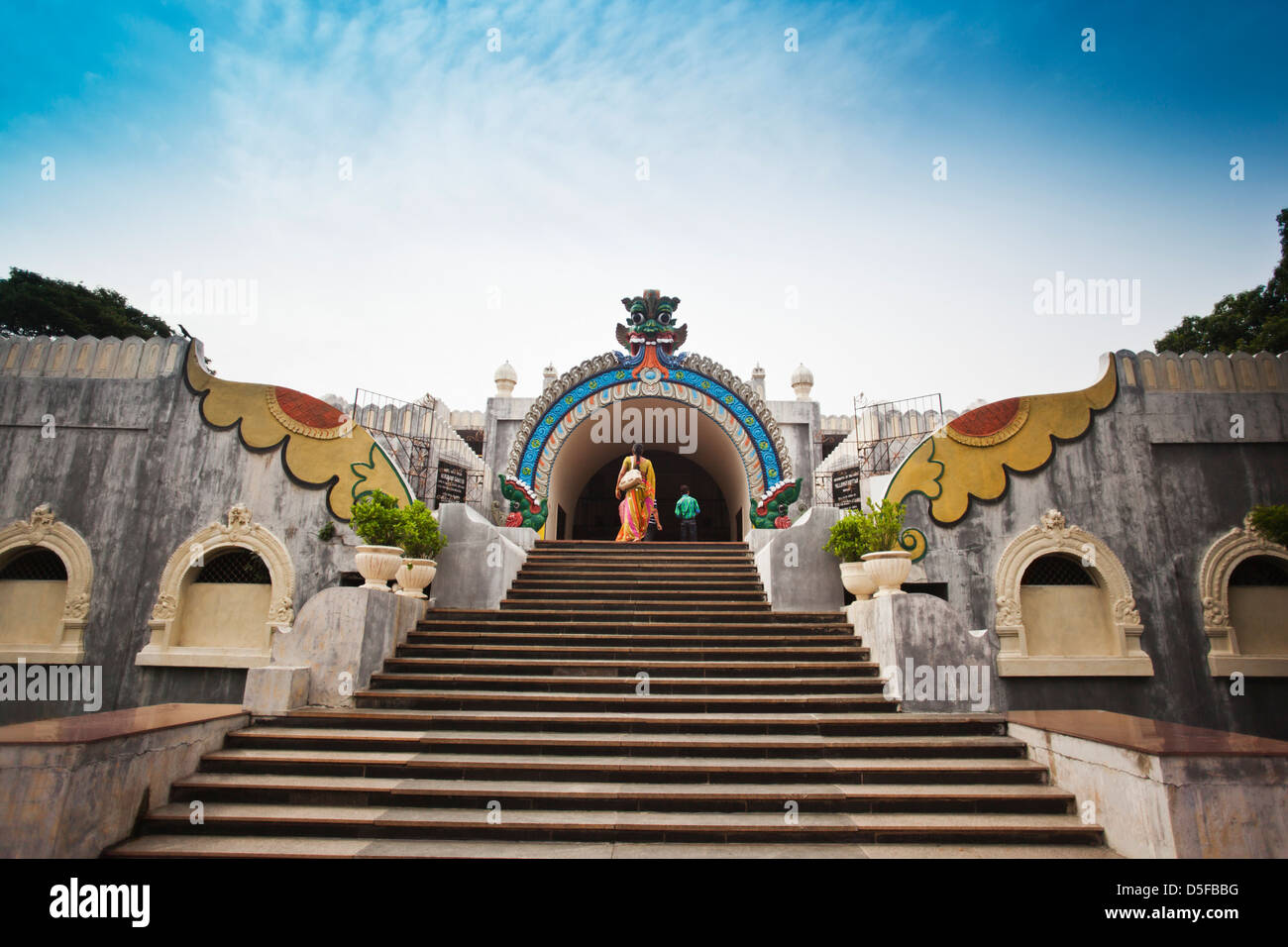 Tourists moving up on entrance steps at Valluvar Kottam memorial to Tamil poet Thiruvalluvar, Chennai, Tamil Nadu, India Stock Photo